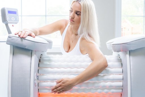 Woman using the Roll Shaper wooden roller system in a guided body position
